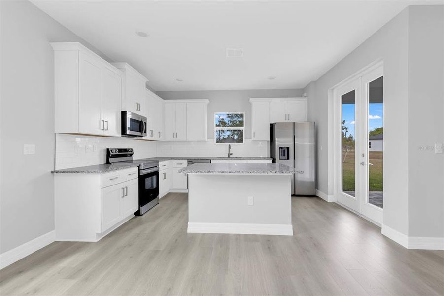Furnished interior view inside a new home in , Punta Gorda (Image 7).