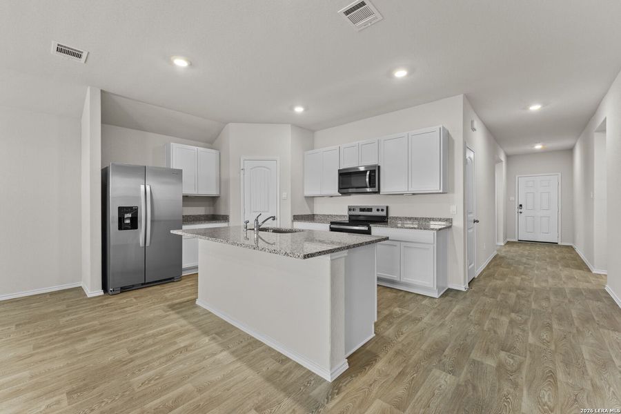 Furnished interior view inside a new home in Swenson Heights, Seguin (Image 5).