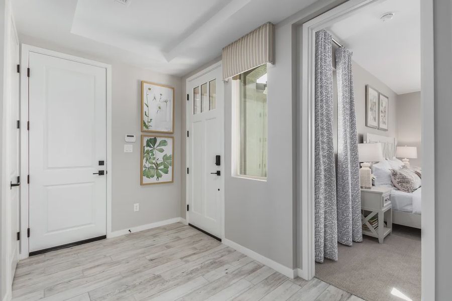 Representative furnished interior of a home built from the 2326 by Elliott Homes in Acacia at Santana, Yuma (Image 7).