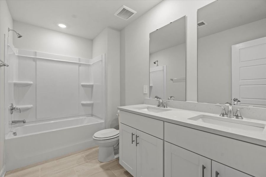 Furnished interior view inside a new home in Chatham Forest, Duncan (Image 12).