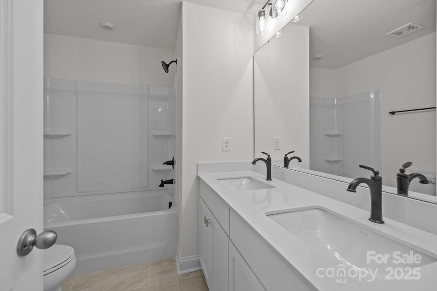 Furnished interior view inside a new home in Greenway Overlook, Charlotte (Image 8). Furnished interior view inside a new home in Greenway Overlook, Charlotte (Image 8).