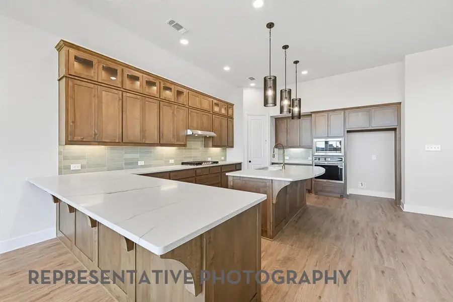 Furnished interior view inside a new home in Canyon Creek Estates, Sherman (Image 4).