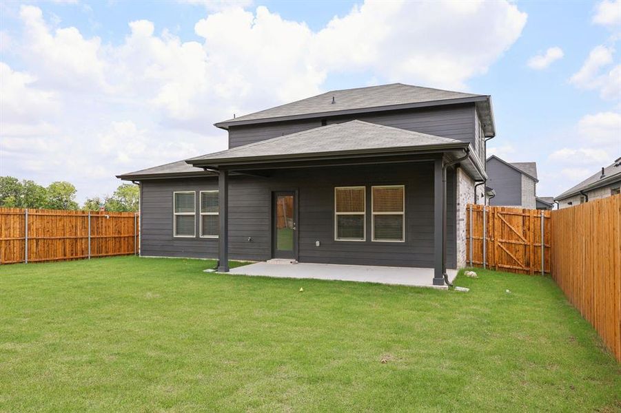 Front exterior of a new home in Westmoor, Sherman, TX, highlighting curb appeal (Image 24).