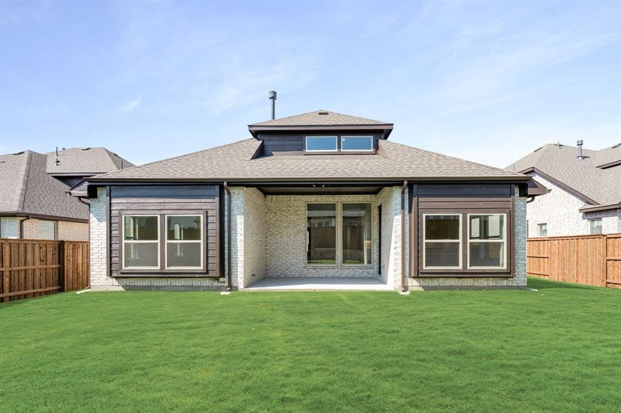Exterior details and patio area of a home in Windsong Ranch Classic 61, Prosper (Image 4). Exterior details and patio area of a home in Windsong Ranch Classic 61, Prosper (Image 4).