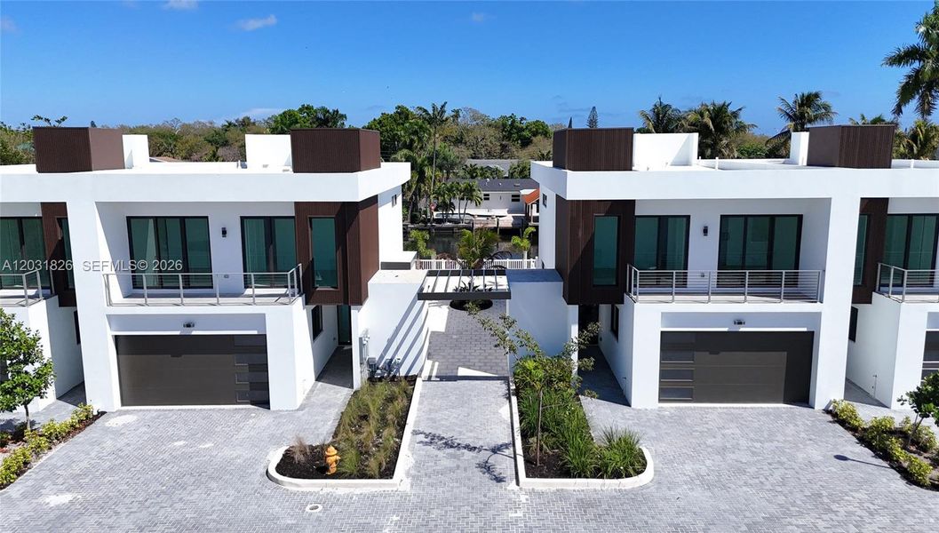 Front exterior of a new home in , Dania Beach, FL, highlighting curb appeal (Image 35).
