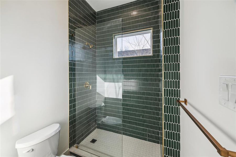 This stunning first floor shower in the guest bathroom is for all to admire.