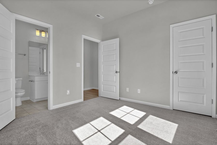 Spacious, unfurnished interior of a new home in Grand Park, Leland (Image 23). Spacious, unfurnished interior of a new home in Grand Park, Leland (Image 23).