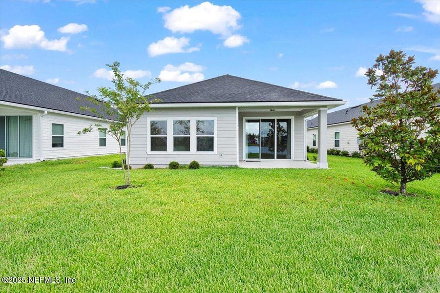 Front exterior of a new home in , St. Augustine, FL, highlighting curb appeal (Image 24).