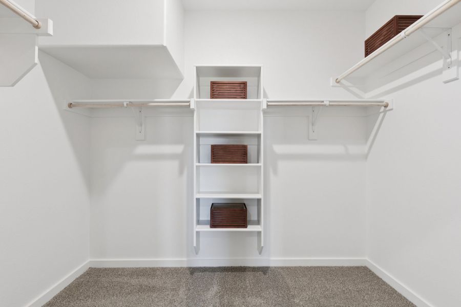Primary Closet in the Magnolia home plan by Trophy Signature Homes – REPRESENTATIVE PHOTO