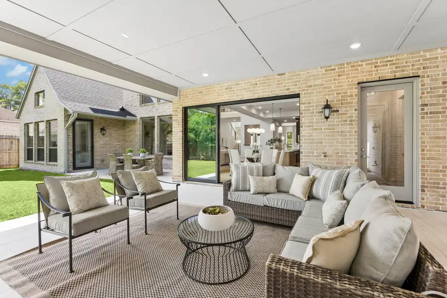 Exterior details and patio area of a home in , Houston (Image 4).