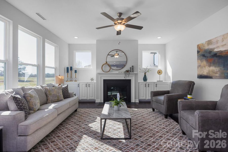 Sample photo of family room with built in cabinets and fireplace
