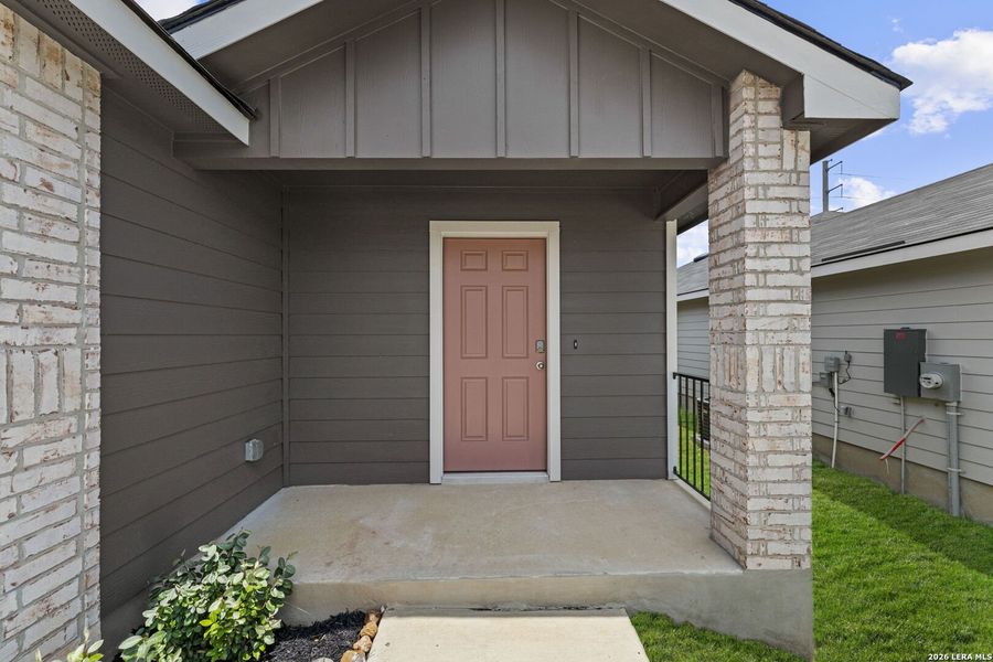 Exterior details and patio area of a home in Hickory Ridge, Elmendorf (Image 2). Exterior details and patio area of a home in Hickory Ridge, Elmendorf (Image 2).