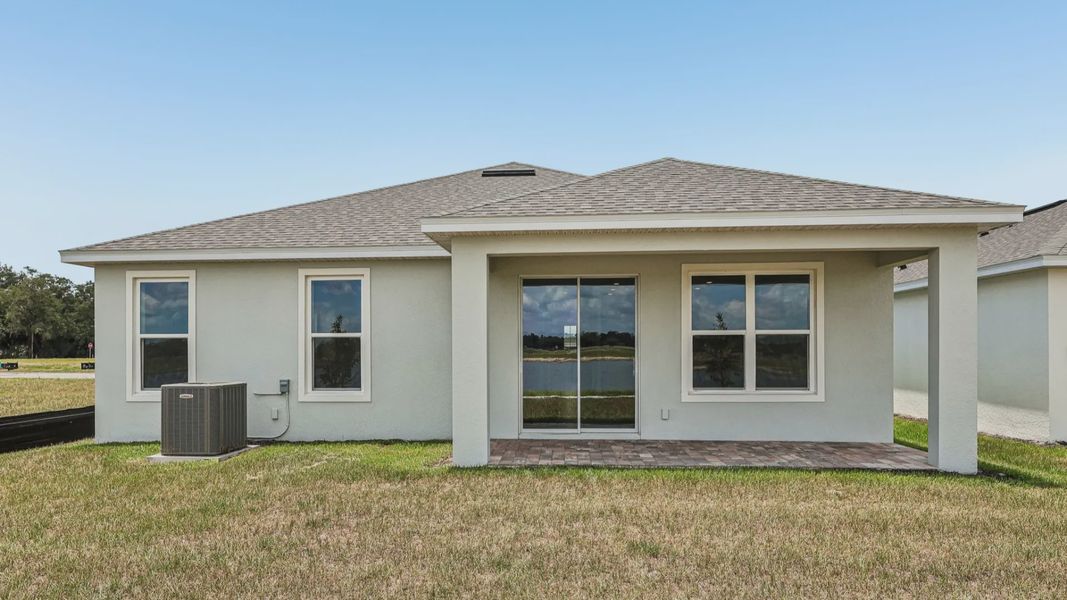Exterior details and patio area of a home in Lakeside at Satilla, St. Cloud (Image 22).