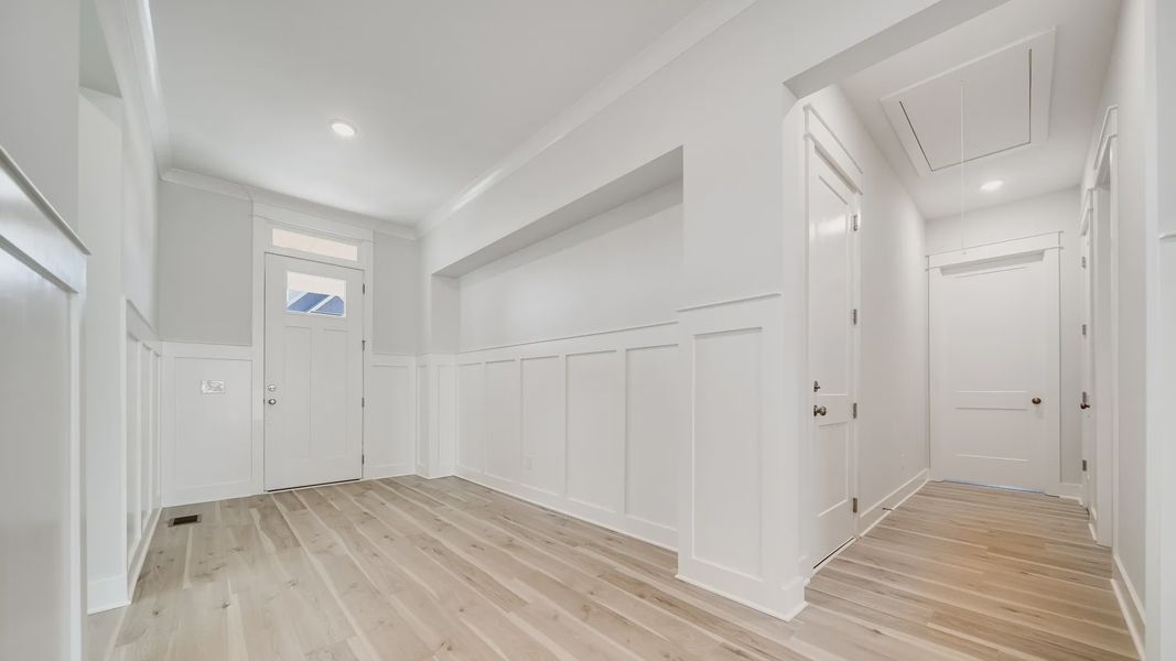 Gorgeous white painted and trimmed interior hallway