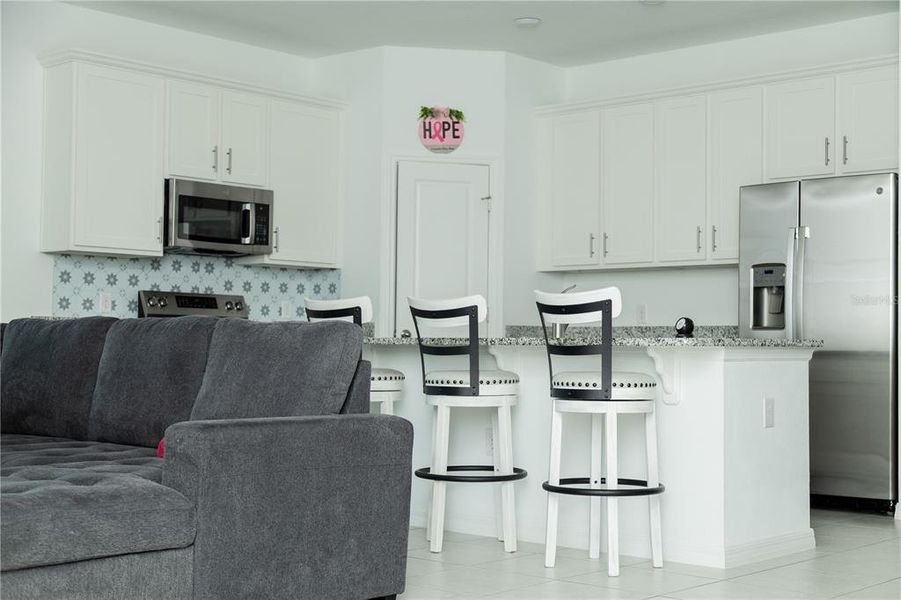 Furnished interior view inside a new home in Village at Windsor Reserve, Eagle Lake (Image 33). Furnished interior view inside a new home in Village at Windsor Reserve, Eagle Lake (Image 33).