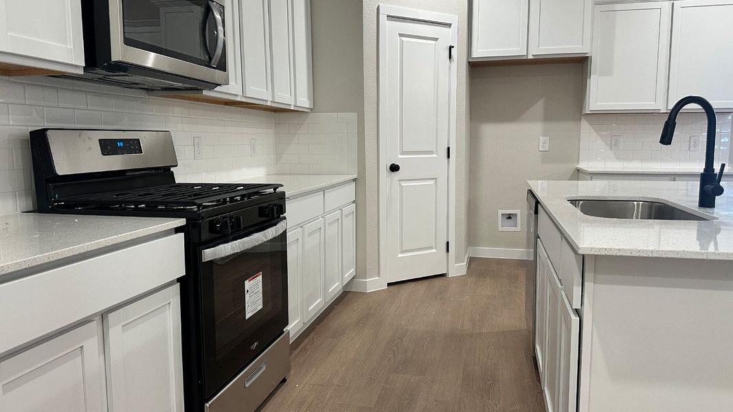 Furnished interior view inside a new home in The Lakes Northwest, Robstown (Image 9).