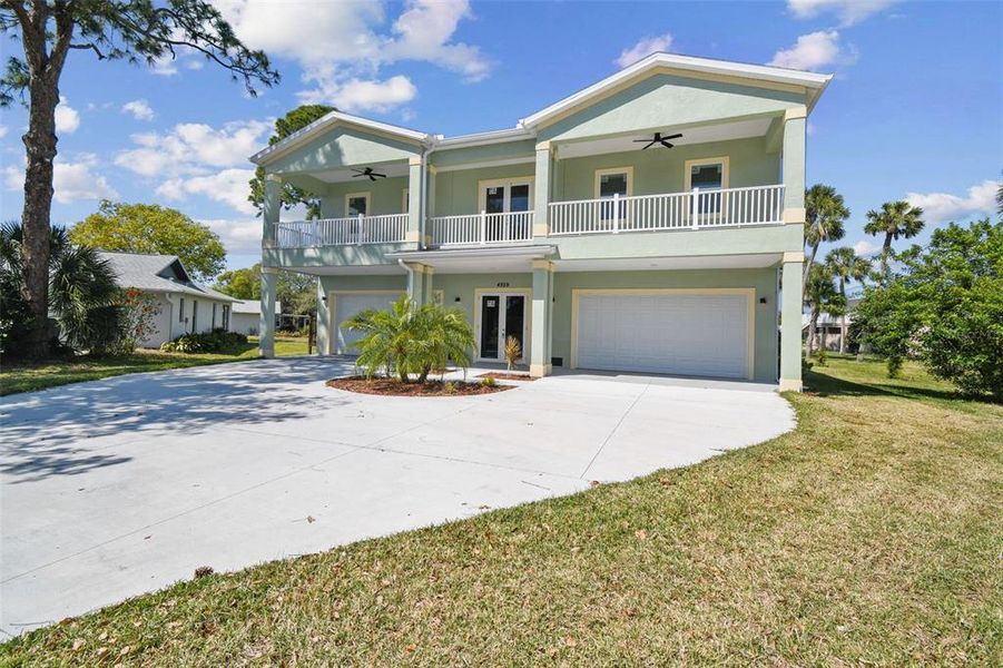 Front exterior of a new home in , New Port Richey, FL, highlighting curb appeal (Image 2).