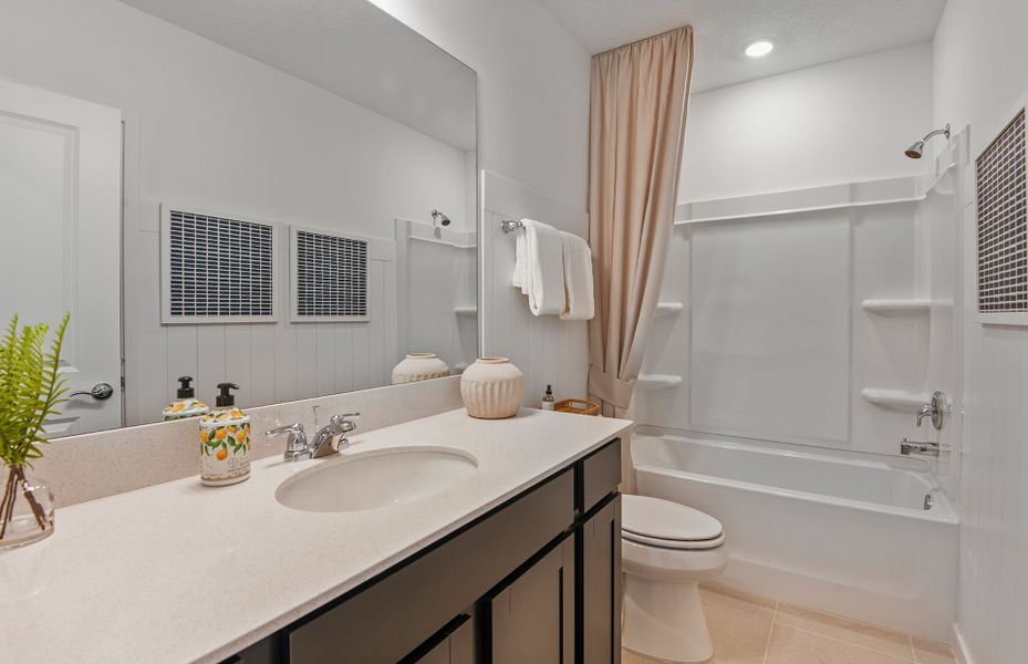 Furnished interior view inside a new home in Riversong, Parrish (Image 12).