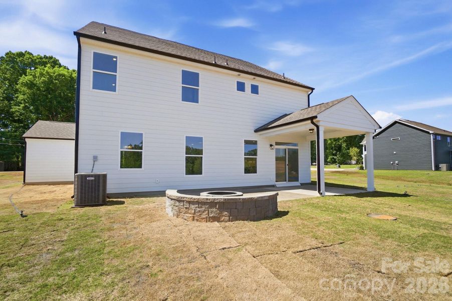 Exterior details and patio area of a home in Chasewood, Mint Hill (Image 22).