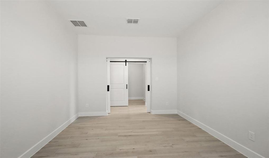 Home office with barn doors