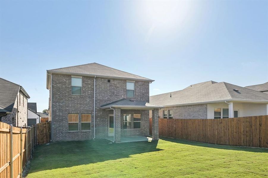 Exterior details and patio area of a home in Simpson Crossing - Spring Series, McKinney (Image 25).