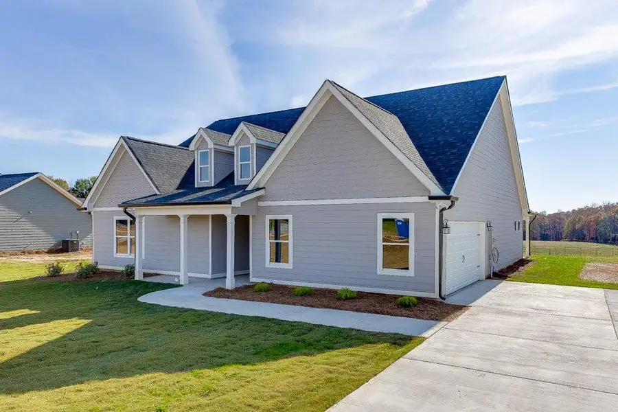 Front exterior of a new home in , Hartwell, GA, highlighting curb appeal (Image 2). Front exterior of a new home in , Hartwell, GA, highlighting curb appeal (Image 2).