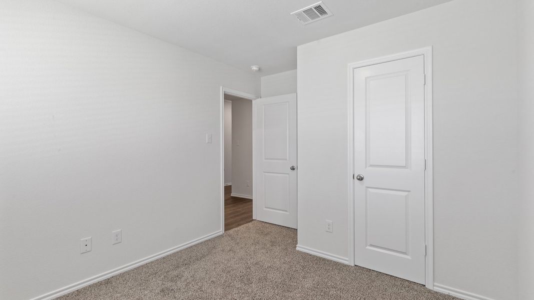 Spacious, unfurnished interior of a new home in Stonewyck Farms, Ennis (Image 22).