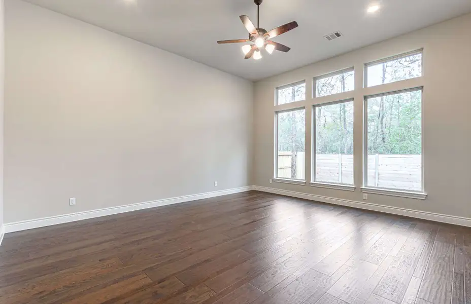 Representative unfurnished interior of a home built from the 3616 by Ravenna Homes in Artavia 70′, Conroe (Image 44).