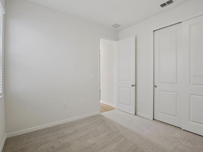 Spacious, unfurnished interior of a new home in Coasterra - Reserve Series, Palmetto (Image 15).