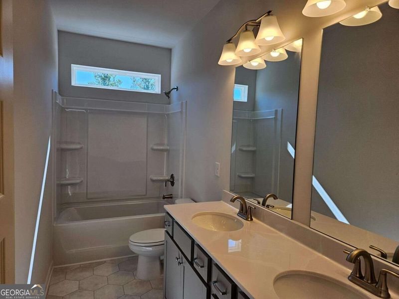 Furnished interior view inside a new home in Maddox Station, Eatonton (Image 9).