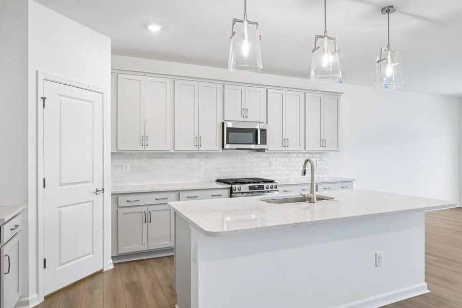 Kitchen featuring the AW Collection® Milan - Chic gray finishes and smooth surfaces shine.
