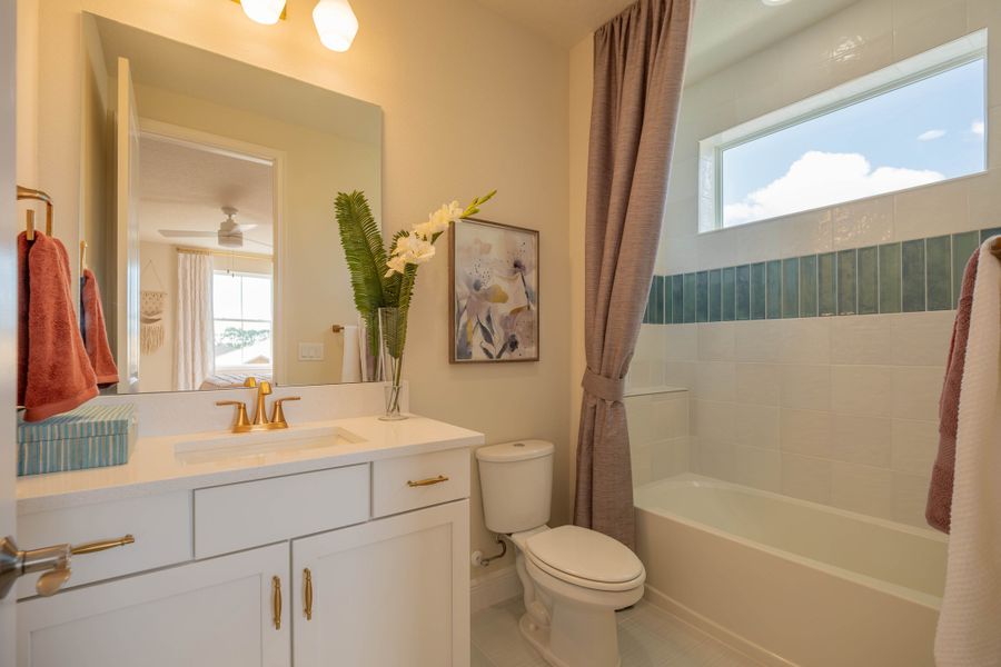 Representative furnished interior of a home built from the Ibis by Jones Homes USA in Legends Preserve, Daytona Beach (Image 24).