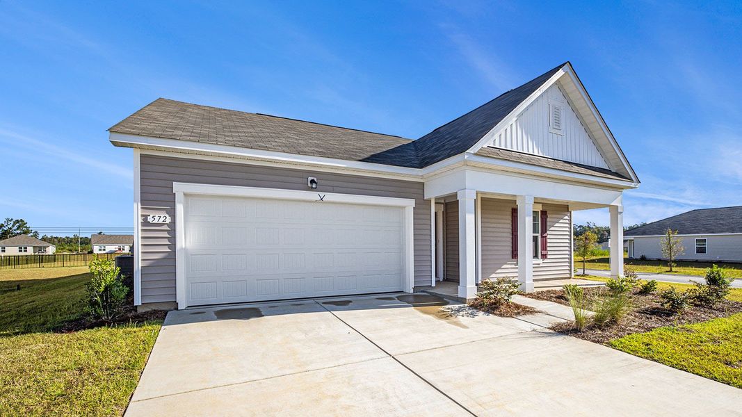 Front exterior of a new home in Ridgefield, Conway, SC, highlighting curb appeal (Image 2).