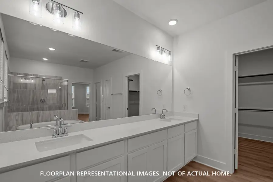 Furnished interior view inside a new home in The Oaks on 6th Street, Magnolia (Image 9). Furnished interior view inside a new home in The Oaks on 6th Street, Magnolia (Image 9).