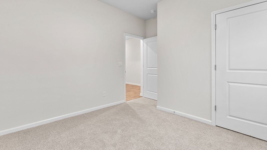 Spacious, unfurnished interior of a new home in The Landing at Summerhaven, Mebane (Image 13).