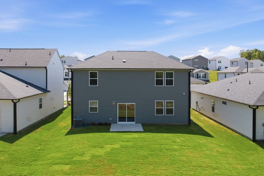 Exterior details and patio area of a home in Carpenter Falls, Durham (Image 3).