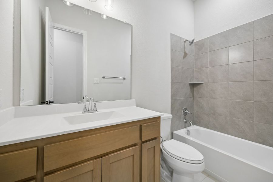 Furnished interior view inside a new home in Mayfield Farms, Arlington (Image 12).