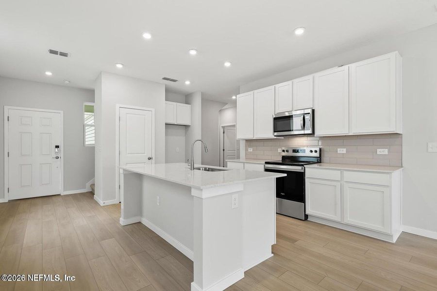 Furnished interior view inside a new home in The Landings at Pecan Park, Jacksonville (Image 3).