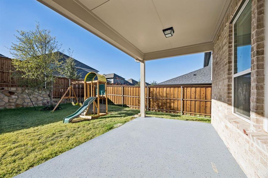 Exterior details and patio area of a home in , McKinney (Image 19). Exterior details and patio area of a home in , McKinney (Image 19).