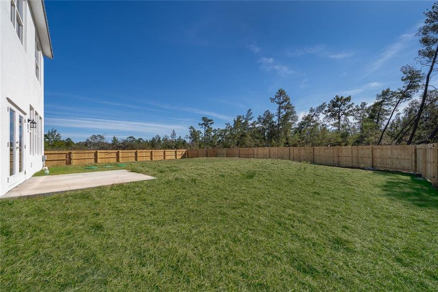 Exterior details and patio area of a home in , Osteen (Image 3).