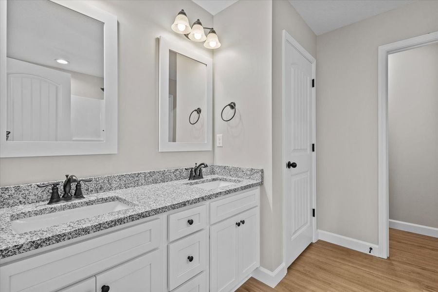 Representative furnished interior of a home built from the Iris by Enchanted Homes in Hampshire Heights, Moore (Image 8).