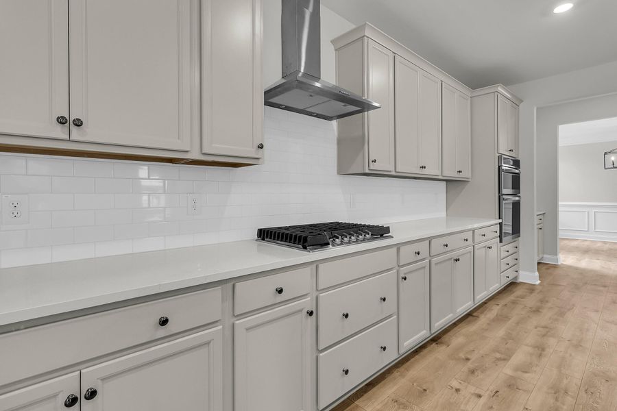 Furnished interior view inside a new home in Tidewater at Lakes of Cane Bay, Summerville (Image 12).