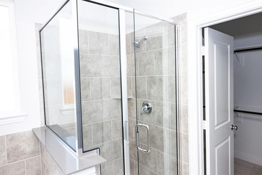 Full bathroom with a stall shower Full bathroom with a stall shower