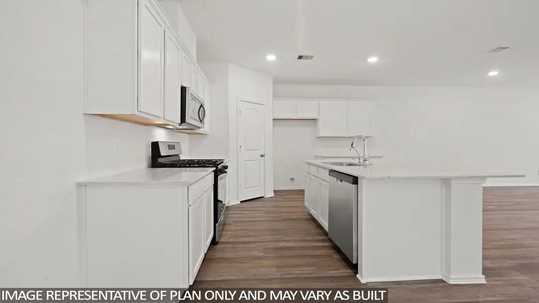 Furnished interior view inside a new home in Sunterra, Katy (Image 4).