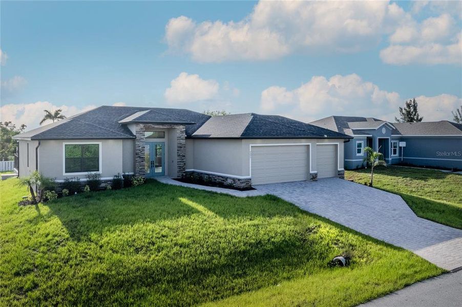 Front exterior of a new home in , Port Charlotte, FL, highlighting curb appeal (Image 2). Front exterior of a new home in , Port Charlotte, FL, highlighting curb appeal (Image 2).