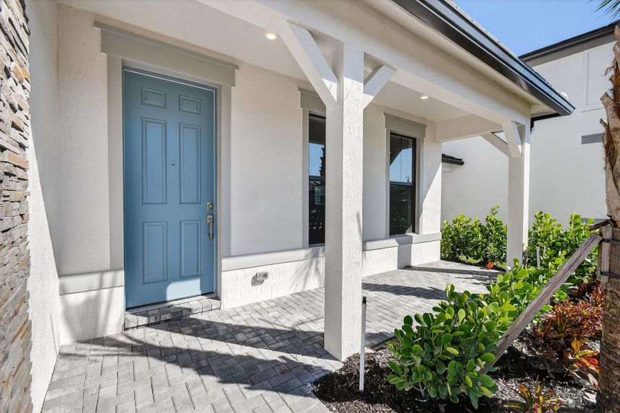 Exterior details and patio area of a home in Hendrix Reserve, Lake Worth (Image 3).