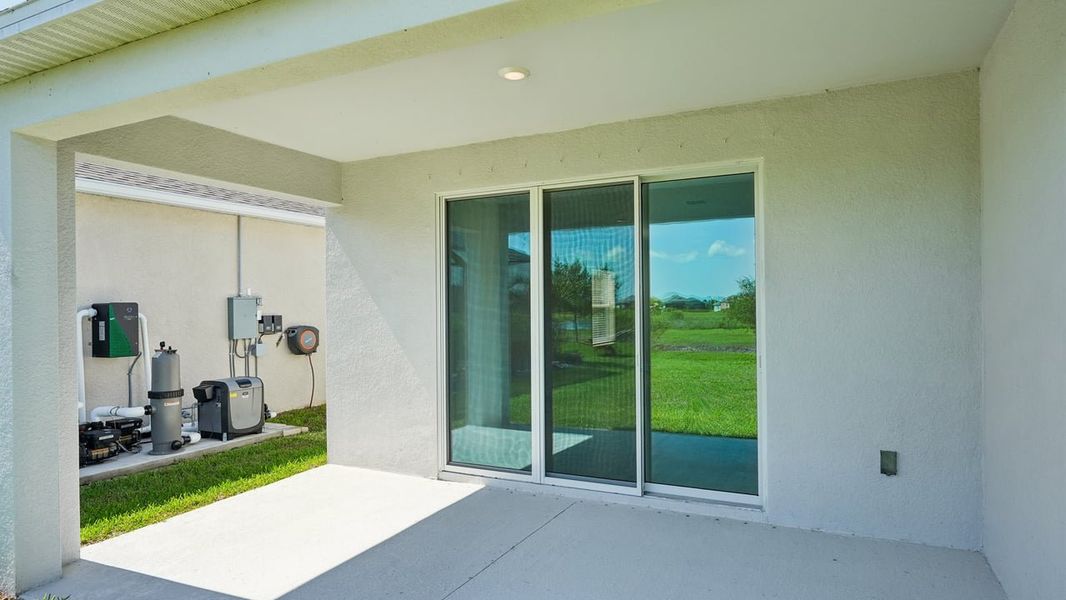 Exterior details and patio area of a home in Heritage Station, Punta Gorda (Image 4).