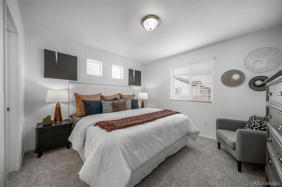 Furnished interior view inside a new home in Reunion, Commerce City (Image 18).