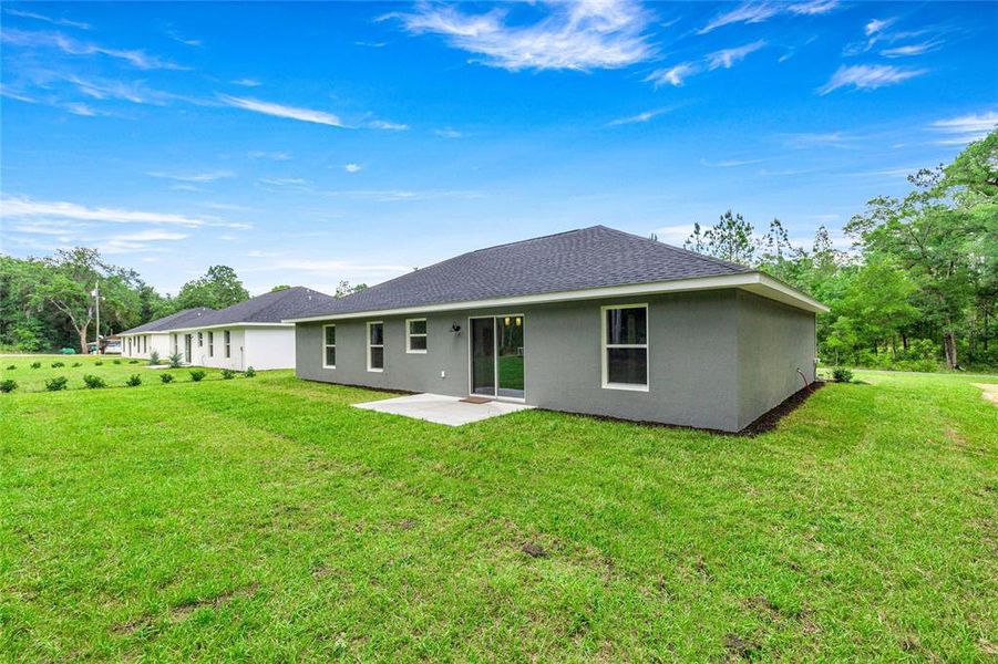 Exterior details and patio area of a home in , Ocala (Image 4).