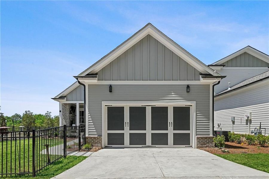 Front exterior of a new home in , Milton, GA, highlighting curb appeal (Image 24).